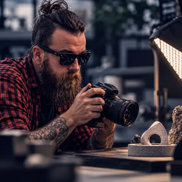 Portrait avatar representing a product photographer.